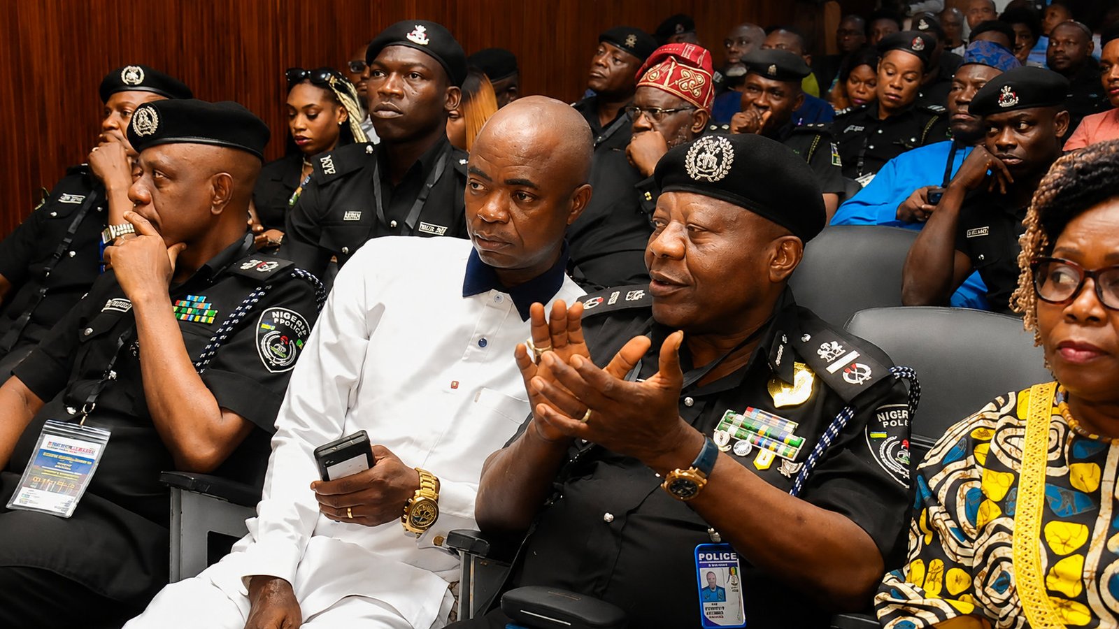 Police officers and civic leaders together